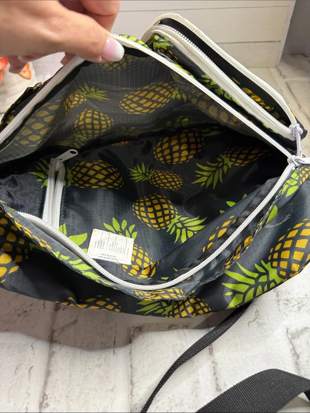 Kavu Black Sling Bag with Yellow Pineapple Print